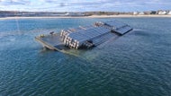 Tugboat intentionally grounds barge taking on water off R.I.