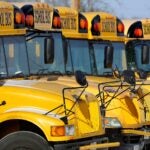 Public school buses are parked in Springfield, Ill.