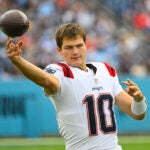New England Patriots quarterback Drake Maye (10) warms up before the first half of an NFL football game against the Tennessee Titans in Nashville, Tenn., Sunday, Nov. 3, 2024.