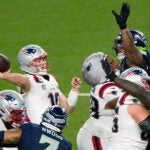 New England Patriots quarterback Drake Maye (10) throws a pass from the pocket during the second half of the NFL Super Bowl 60 football game against the Seattle Seahawks, Sunday, Feb. 8, 2026, in Santa Clara, Calif.