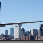 Crime Man pleads guilty to opening emergency exit door on flight from Boston