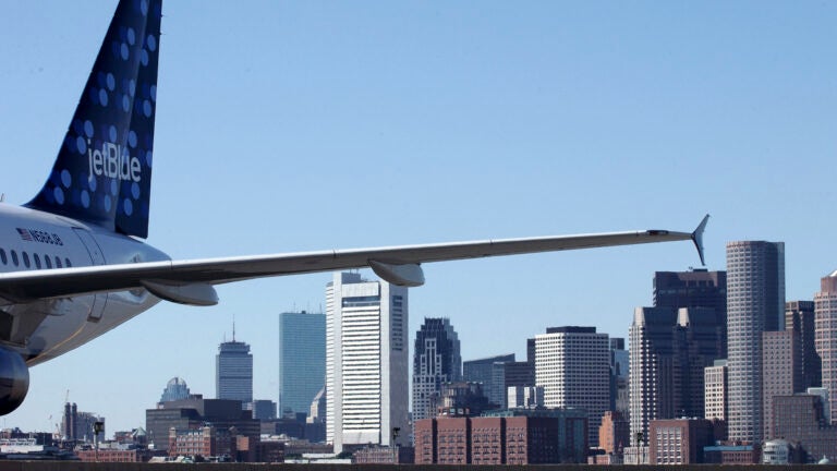 Man pleads guilty to opening emergency exit door on flight from Boston