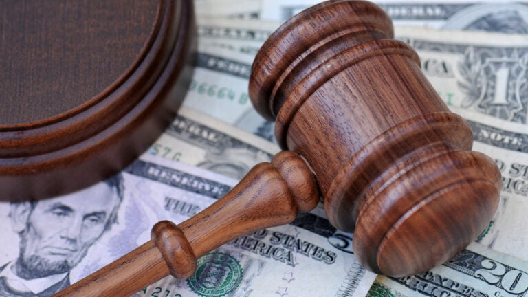 Two men pleaded guilty Friday to charges of bank fraud, conspiracy to commit bank fraud, and conspiracy to commit money laundering.