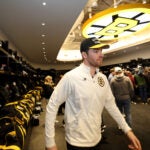 Bruins goalie Jeremy Swayman leaves the locker room during the Bruins end of season locker cleanout at Warrior Ice Arena on Sunday, May 3, 2026.