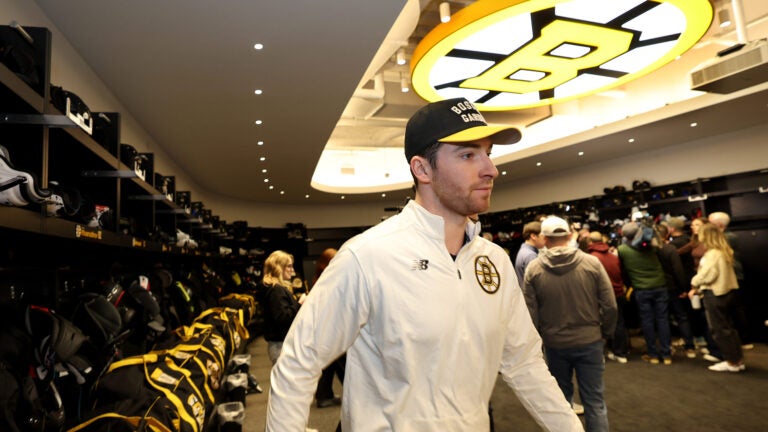 Bruins goalie Jeremy Swayman leaves the locker room during the Bruins end of season locker cleanout at Warrior Ice Arena on Sunday, May 3, 2026.