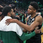 The Celtics Jayson Tatum (left) and the Bucks Giannis Antetokounmpo (right) are pictured aftetr the game. The Boston Celtics hosted the Milwaukee Bucks for Game Seven of their NBA basketball Eastern Conference Semi-Final Playoff series at the TD Garden.