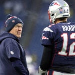 Bill Belichick and Tom Brady on the field before the game. The New England Patriots host the Dallas Cowboys at Gillette Stadium.
