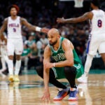 The Philadelphia 76ers high-five as Boston Celtics guard Derrick White (9) looks on late in the fourth quarter. The Boston Celtics hosted the Philadelphia 76’ers in Game 7 of the first round of the NBA Playoffs on Saturday, May 2, 2026 at TD Garden in Boston, MA.