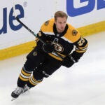 Boston Bruins rookie Fabian Lysell (23) skates during warmups prior to an NHL hockey game against the Columbus Blue Jackets on Saturday Dec. 28, 2024 in Boston. Lysell, who is from Sweeden, was the team's first round draft choice in the 2021 NHL Entry Draft, and is making his NHL debut tonight.
