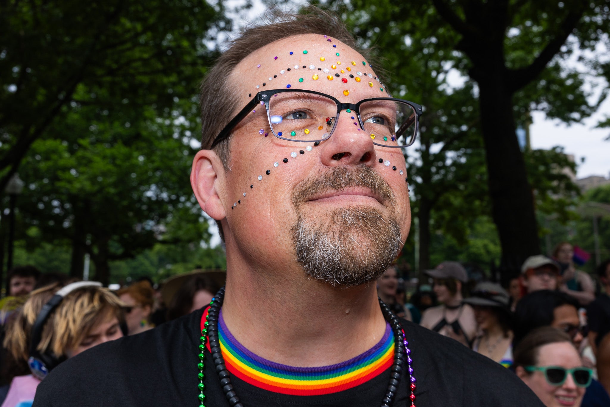 Josiah Babcock, of Maine, poses for a portrait while wearing rhinestones as a part of Pride festivities.