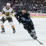 Utah Mammoth right wing JJ Peterka (77) skates with the puck during the first period of Game 6 in the first round of an NHL hockey Stanley Cup playoff series against the Vegas Golden Knights, Friday, May 1, 2026, in Salt Lake City.