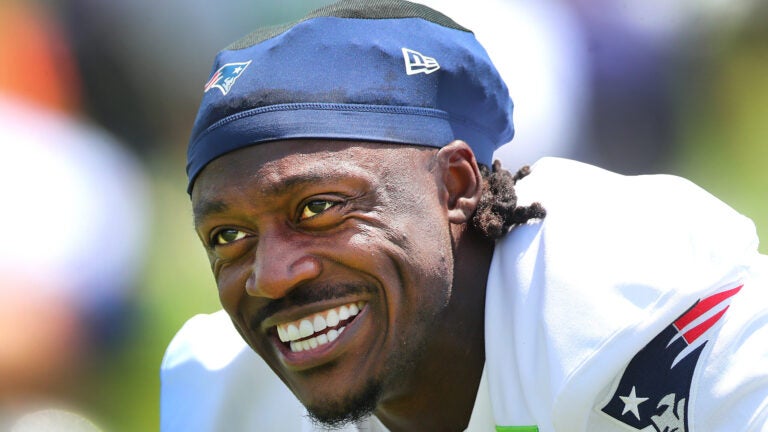 The New England Patriots new wide receiver A.J. Brown smiles during stretching as he took part in his first practice as the Patriots held practice at their practice field at Gillette Stadium Tuesday.