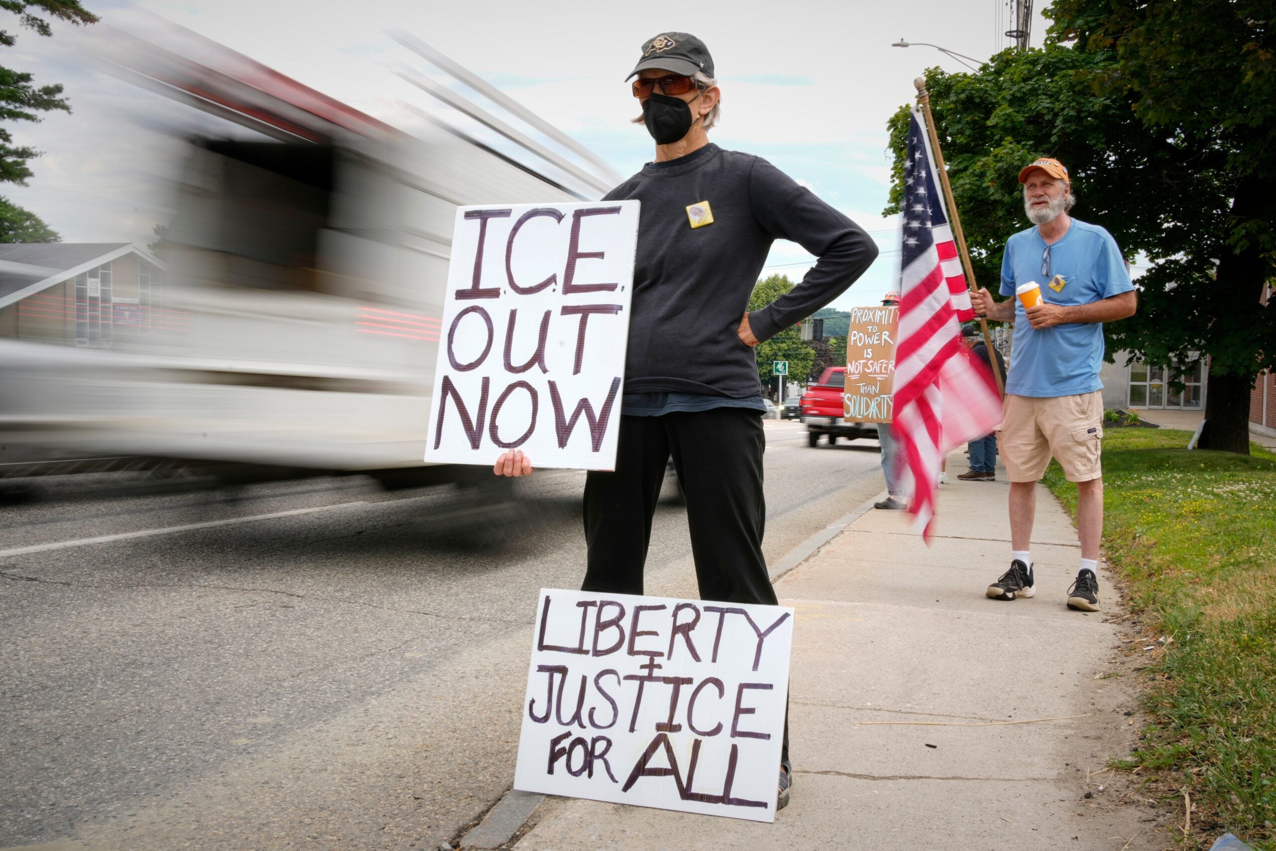 Members of the Capitol Area Indivisible group protest against U.S. Immigration and Customs Enforcement.