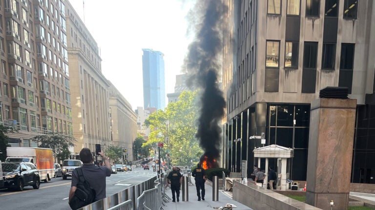 Incendiary device erupts outside New York federal building. FBI says person in custody. Incendiary device erupts outside New York federal building. FBI says person in custody.