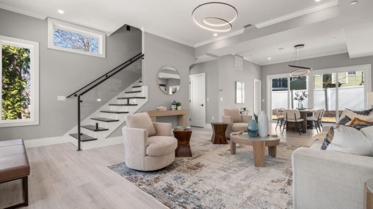 A modern 3-bedroom condo in Newton — can you guess the price?