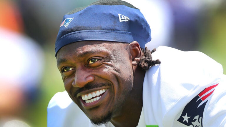 Foxborough 06/02/202 The New England Patriots new wide receiver A.J. Brown smiles during stretching as he took part in his first practice as the Patriots held practice at their practice field at Gillette Stadium Tuesday.