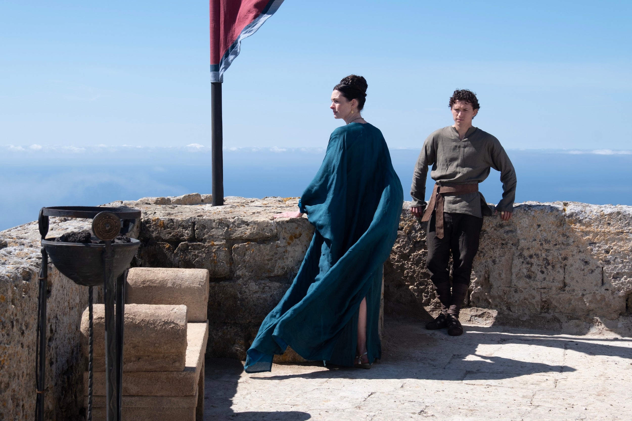 Anne Hathaway as Penelope and Tom Holland as Telemachus 