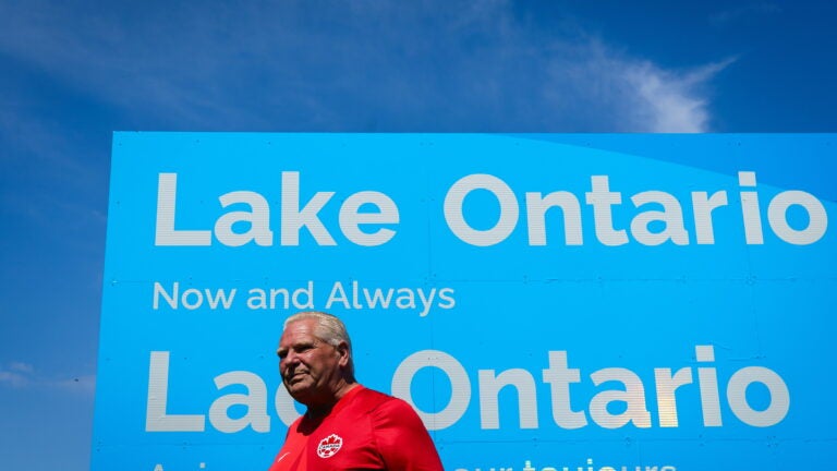 Photo: boston.com Ontario Premier Defies Trump With Giant Lake Ontario Sign After Name Change Dispute