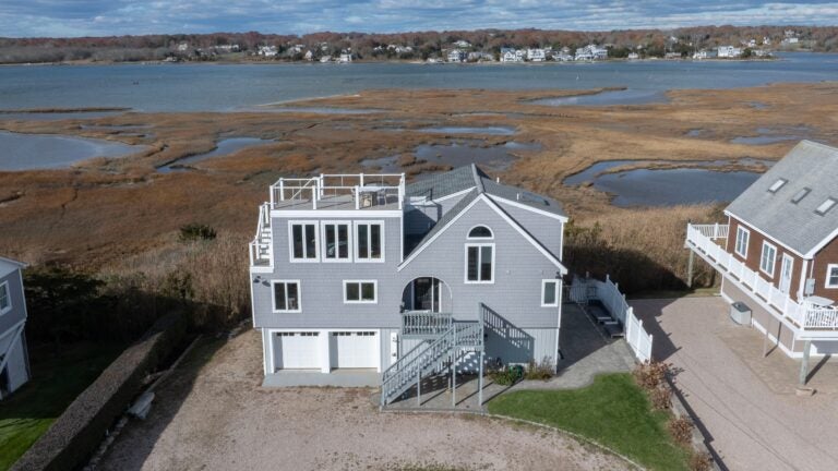 R.I. beach house with water views on both sides for under m
