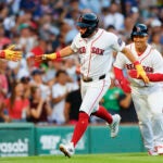 Red Sox Durbin hits grand slam and Abreu goes deep twice as streaking Red Sox rout White Sox 14-2 1 min read