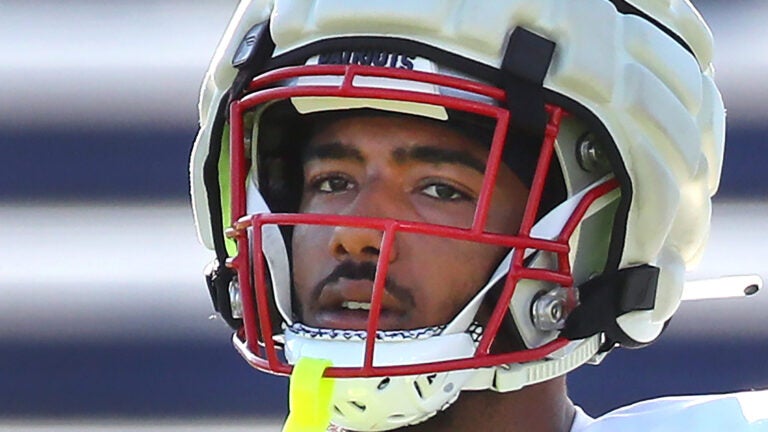 The Patriots practiced on the practice field at Gillette Stadium. Ja’Lynn Polk takes a breather during warmups.