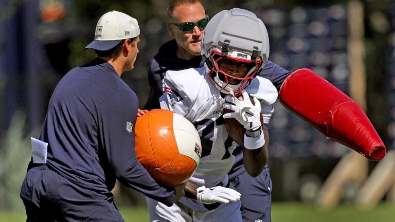 Mike Vrabel sends message to Romeo Doubs after shaky debut