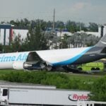 National News Federal investigators probe Amazon cargo jet’s fiery runway crash that killed 5 in Miami