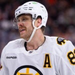 Boston Bruins' David Pastrnak looks on during the second period of an NHL hockey game against the Philadelphia Flyers, Feb. 28, 2026, in Philadelphia.