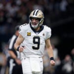 New Orleans Saints quarterback Drew Brees (9) celebrates a touchdown in the first half of an NFL wild-card playoff football game against the Minnesota Vikings, Sunday, Jan. 5, 2020, in New Orleans.