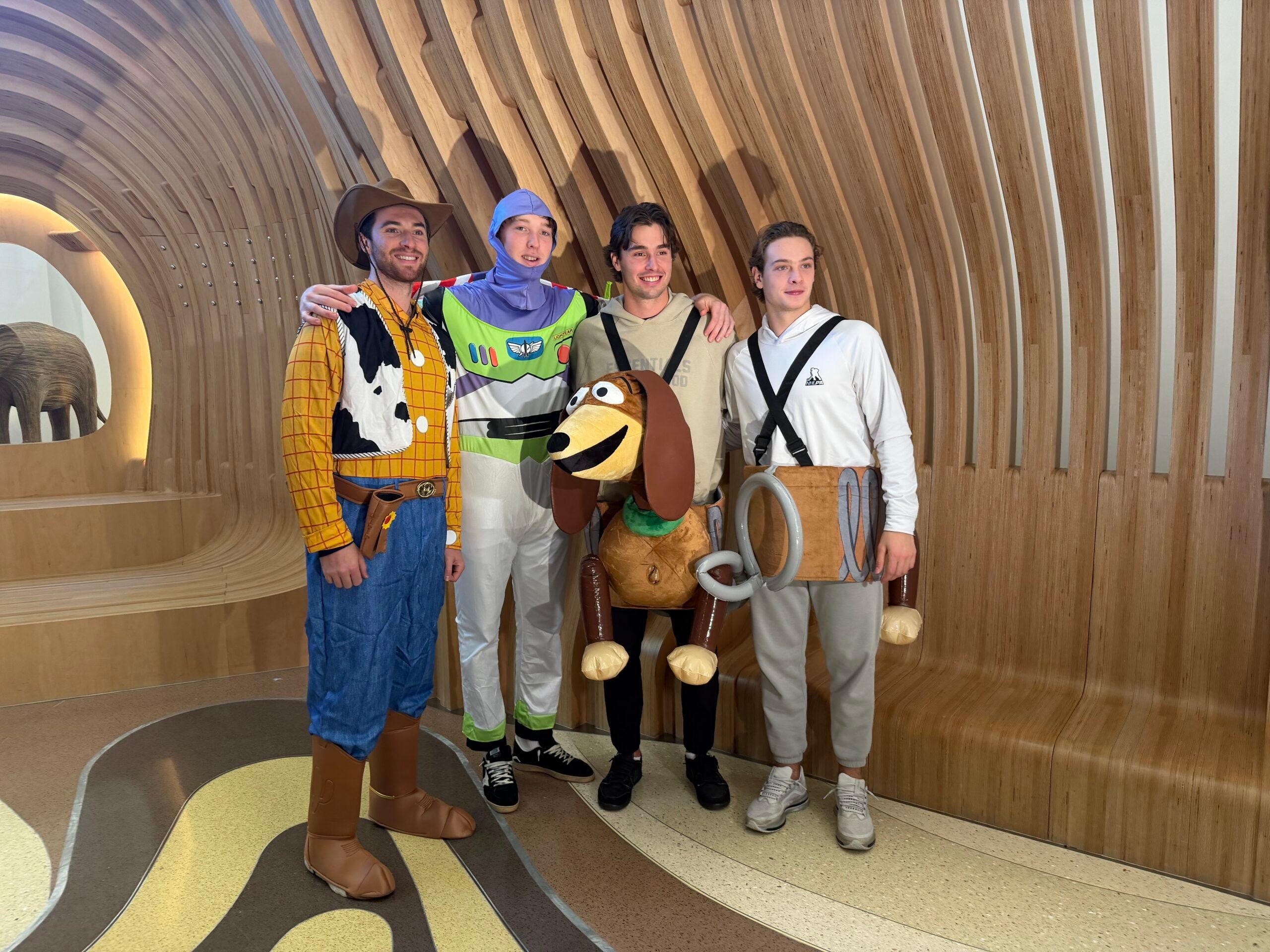 boston.com - Conor Ryan - Bruins dress up as 'Toy Story' characters as part of annual Halloween visit to local hospitals
