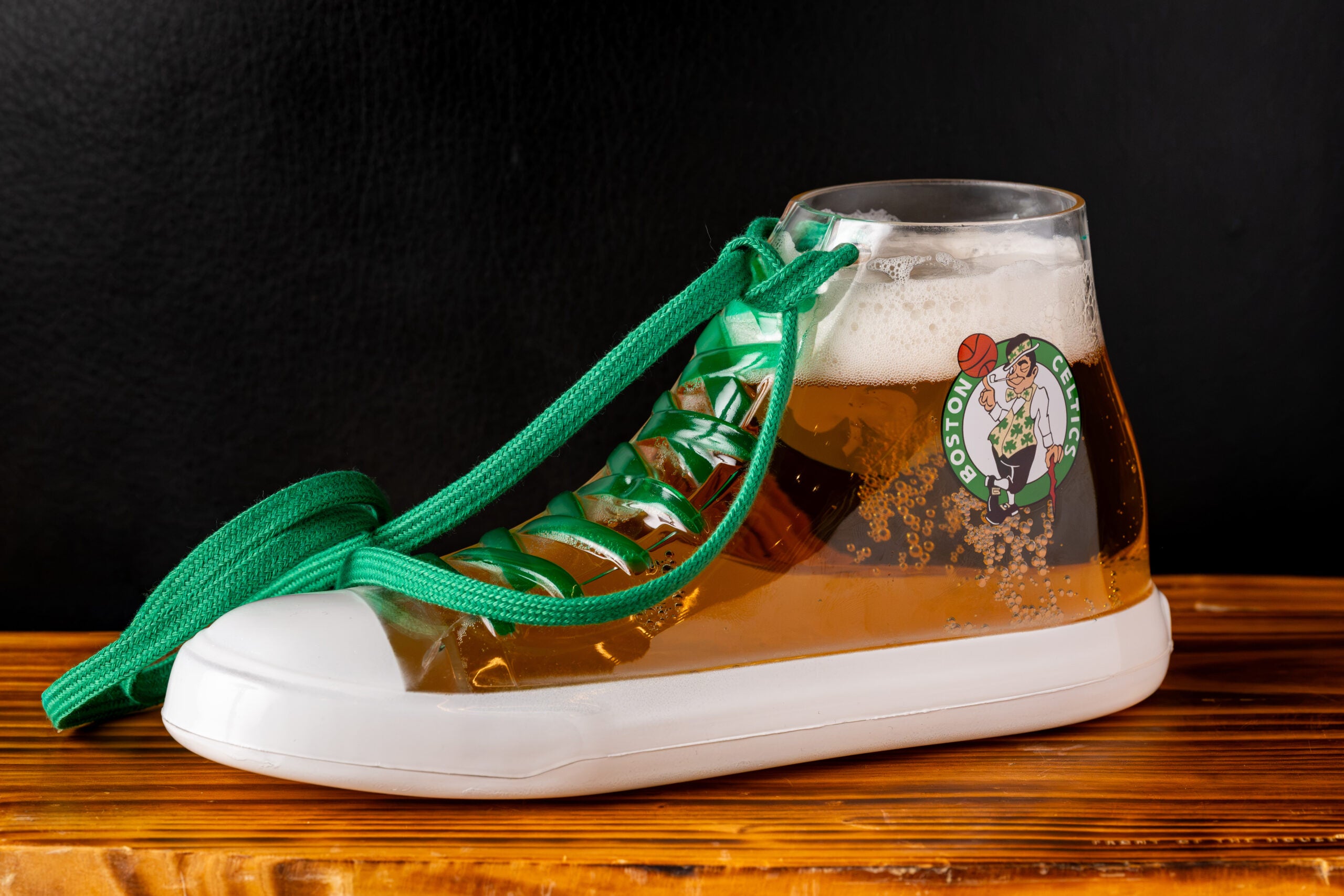 boston.com - Madison Lucchesi - TD Garden is selling beer in Celtics sneaker and Bruins glove cups