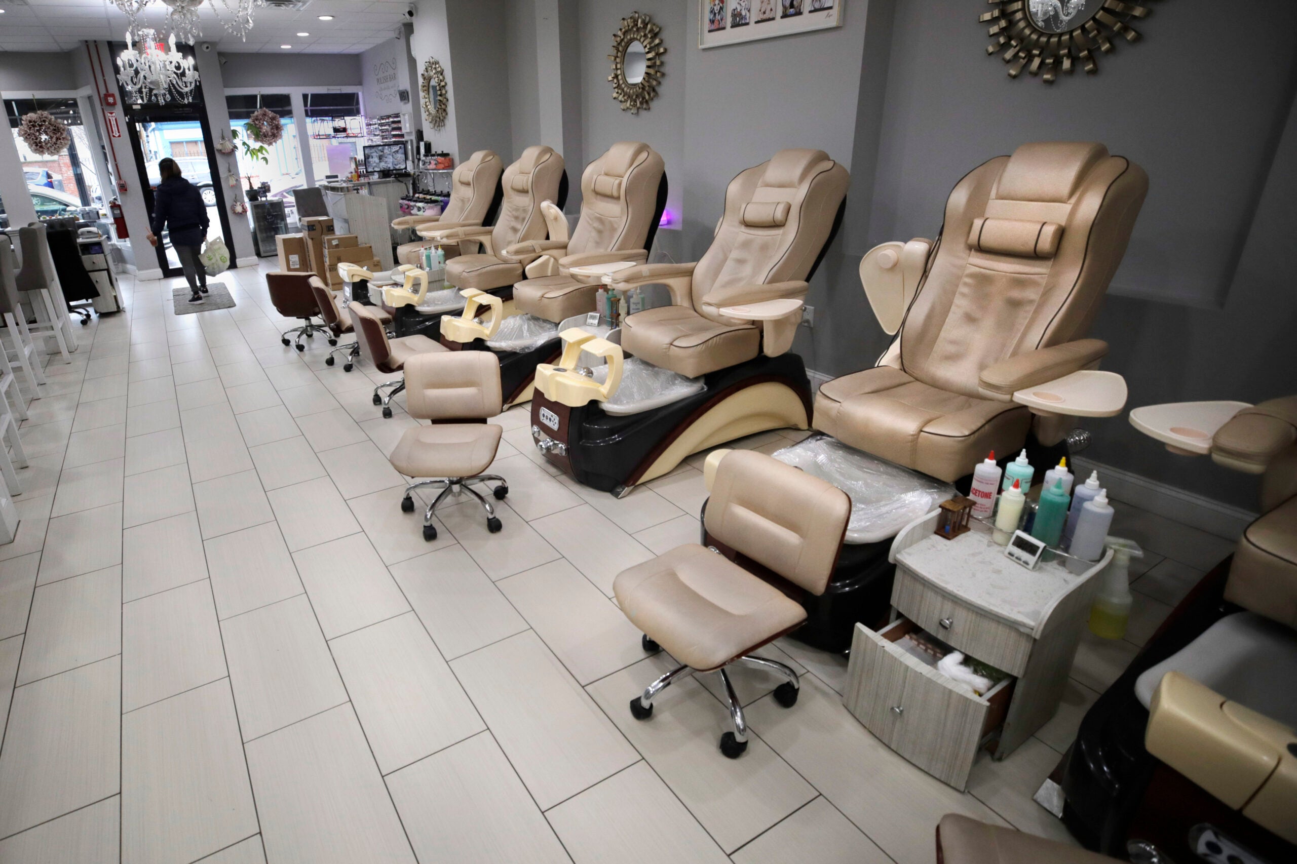 boston.com - Annie Jonas - I make $10 a day': Nail salon workers describe the struggle to get by