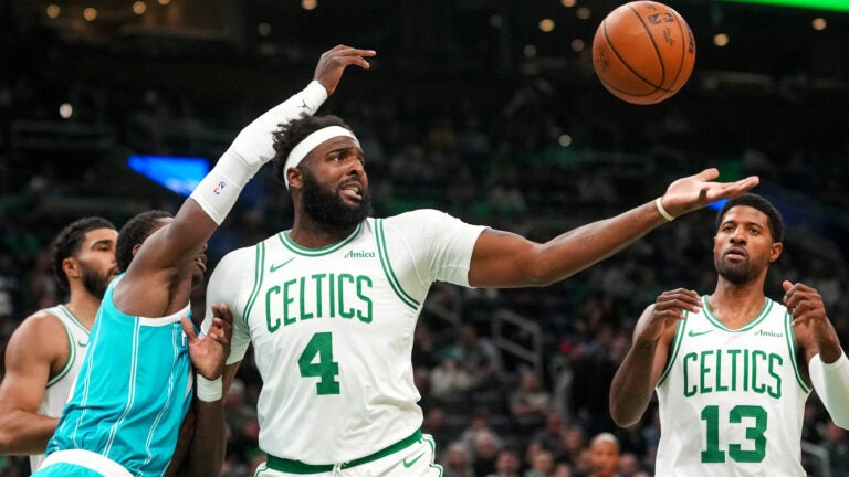 Boston Celtics center/forward Mitchell Robinson (4) battles for a defensive rebound during the 2nd quarter. The Boston Celtics host the Charlotte Hornets in a pre season exhibition game Wednesday, October 14, 2026 at TD Garden in Boston, MA.