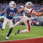 New England Patriots Efton Chism III (86) catching the game winning 23-yard touchdown reception beating Buffalo Bills cornerback DAvidson Igbinosun (21) during fourth quarter NFL action at Highmark Stadium on Sunday October 4, 2026.