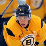 The Boston Bruins held training camp at Warrior Ice Arena. Matt Poitras lines up during a drill.