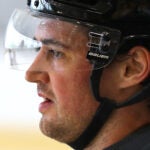 The Boston Bruins held training camp at Warrior Ice Arena. Connor Clifton looks on during a drill.